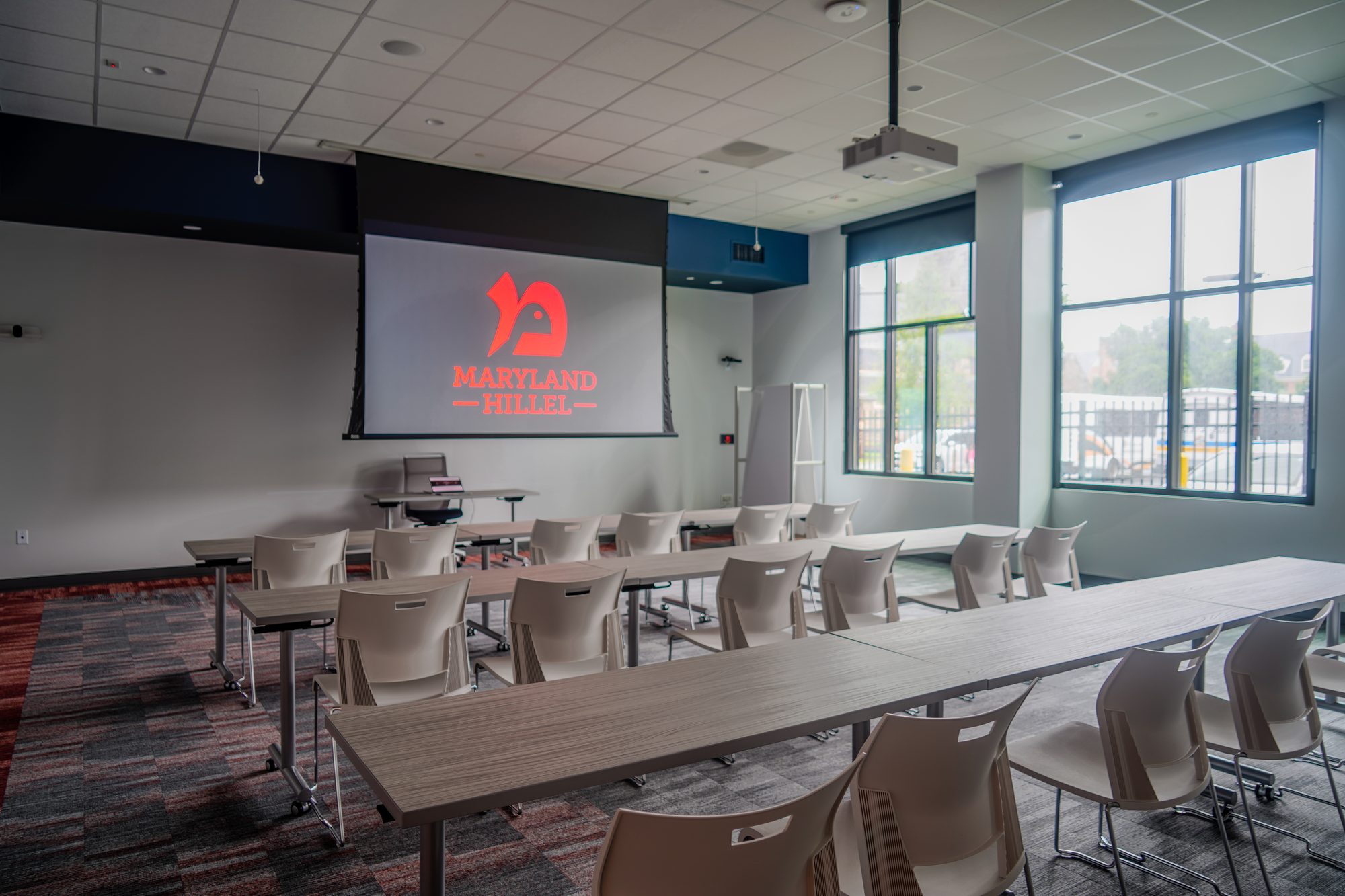 Training room with projection and networked AV, cabled and commissioned by NET-AV